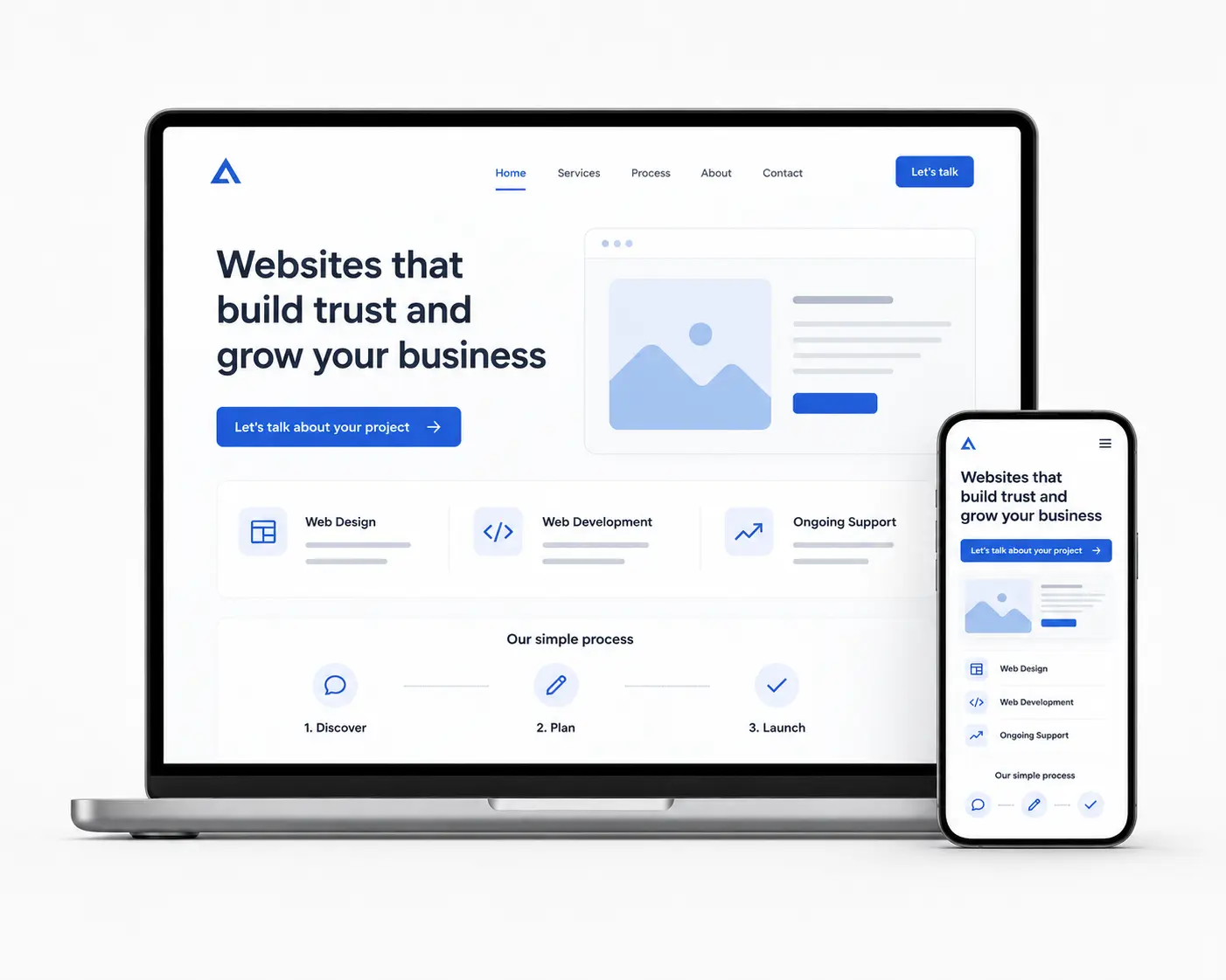 Responsive business website displayed on a laptop and smartphone